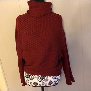 Red Anthropologie turtleneck